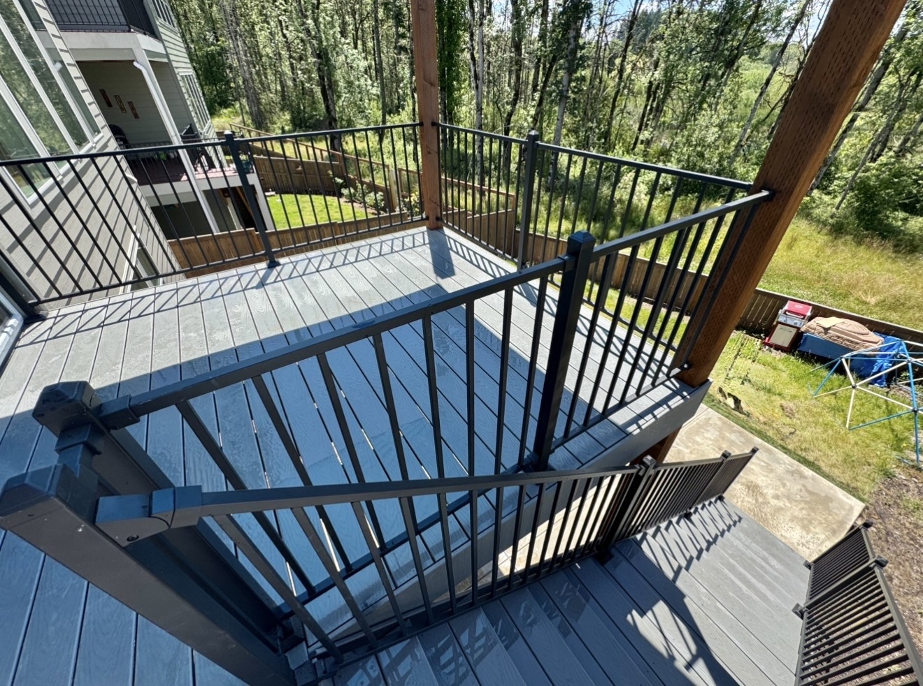 Upper composite deck overlook, Bethany Custom composite deck build in Bethany — upper overlook off new home addition